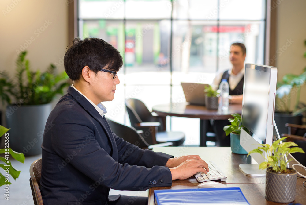 Business people are using Computer and look to theRight side. Business people are using Computer and look to theRight side.