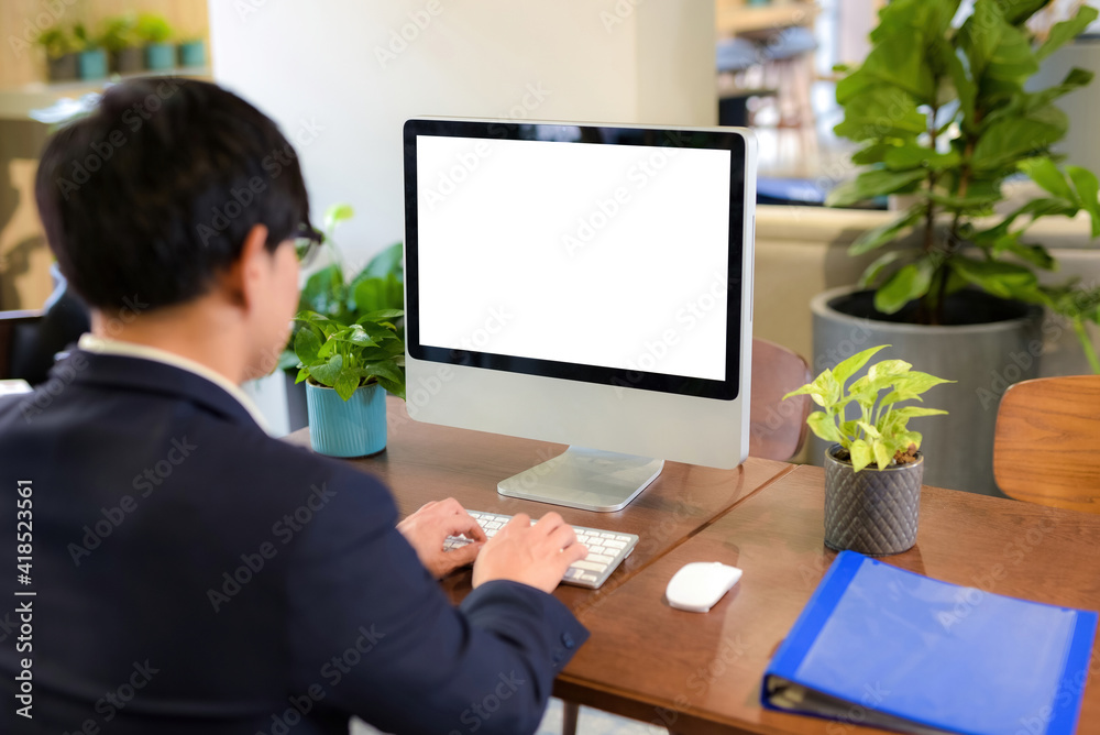 .A business man typing a message and Computer white screen Light, leave some space to fill in the message. Inside the work Space.computer White space to fill in.. .A business man typing a message and Computer white screen Light, leave some space to fill in the message. Inside the work Space.computer White space to fill in..