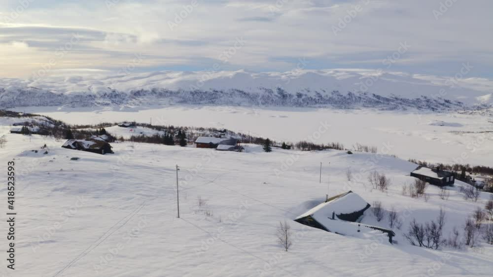 Amazing White Mountain View In Huagastol Norway In Winter - aerial shot Amazing White Mountain View In Huagastol Norway In Winter - aerial shot