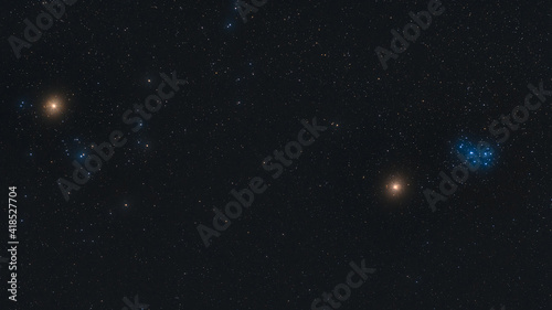 The bright star Aldebaran, the red planet Mars, and the Pleiades in the constellation Taurus, photographed on March 5th, 2021, from Ludwigshafen in Germany.