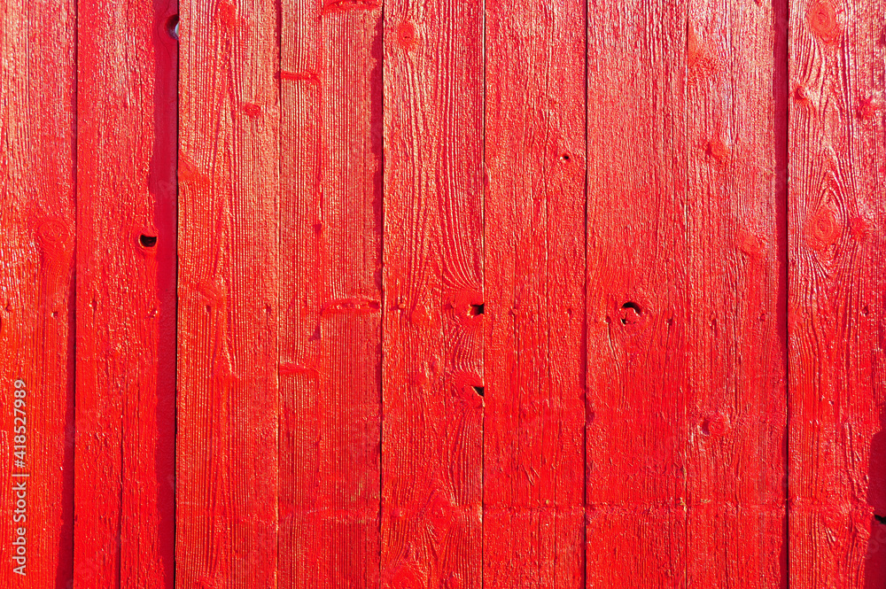 Bright red wood panels as the sun rises Bright red wood panels as the sun rises