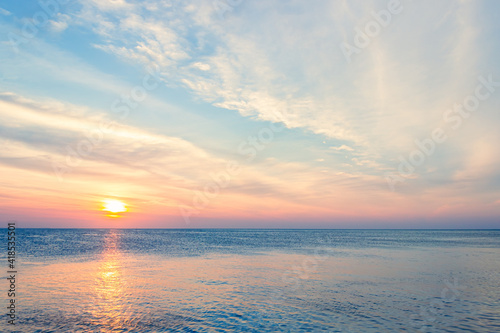 sunset over the sea in the evening