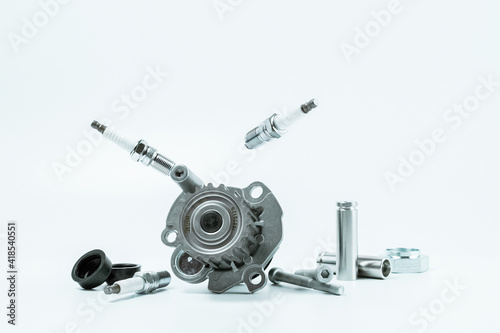 Car engine parts. Auto motor mechanic spare or automotive piece on white background. Set of new metal car part. Automobile engine service.