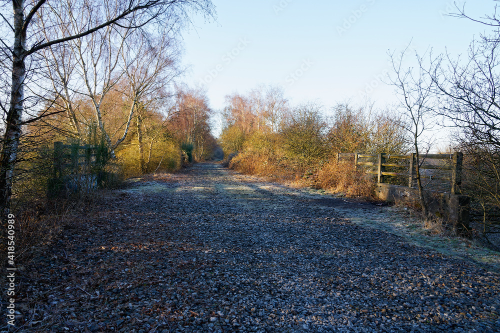 A disused railway track on a frosty winter morning
