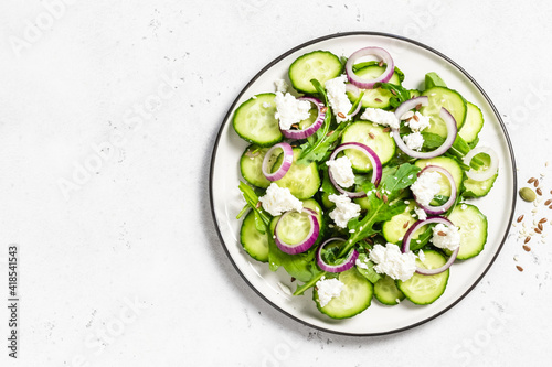 Classic cucumber salad. Space for text, top view.