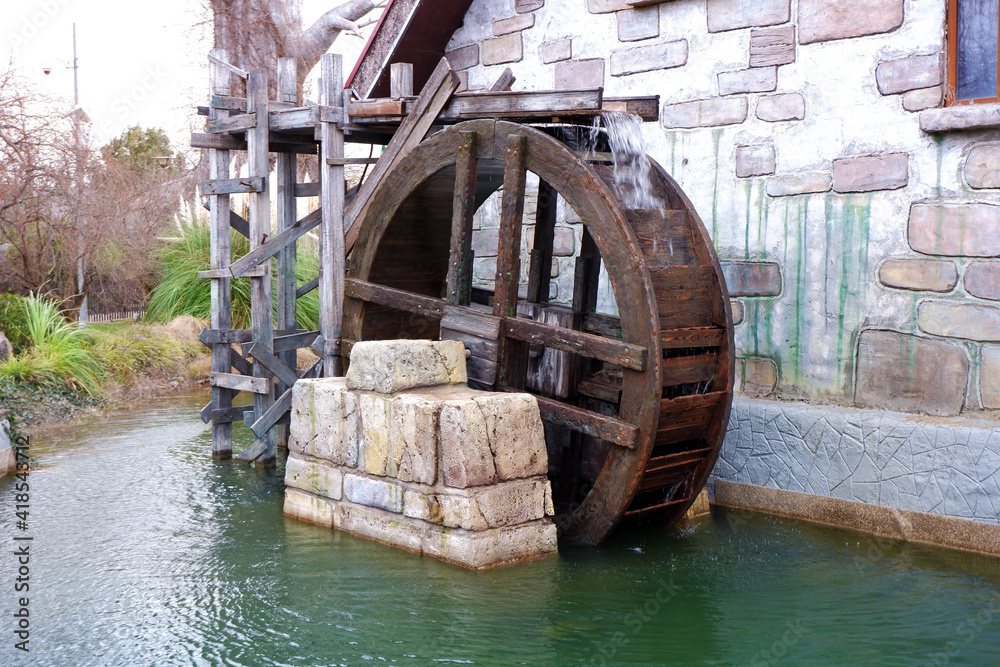 Water mill wheel on river