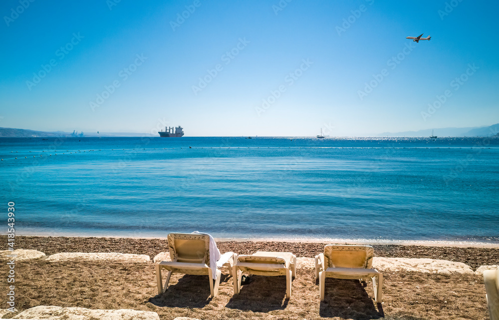 Morning at central public beach in Eilat - famous tourist resort and recreational city in Israel