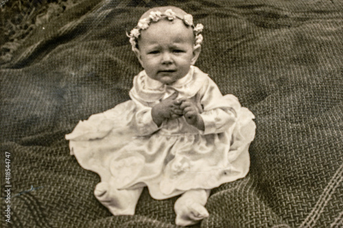 Latvia - CIRCA 1940s: Portrait of baby girl in studio. Vintage archive Art Deco era photography