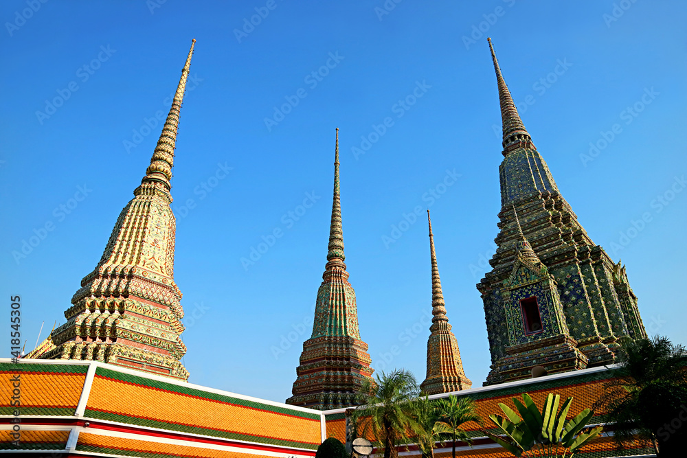 Group of Large Stupas Calls Phra Maha Chedi Si Rajakarn, Dedicated to the First Four Kings of Chakri Dynasty, Located in Wat Pho Temple, Bangkok, Thailand Group of Large Stupas Calls Phra Maha Chedi Si Rajakarn, Dedicated to the First Four Kings of Chakri Dynasty, Located in Wat Pho Temple, Bangkok, Thailand