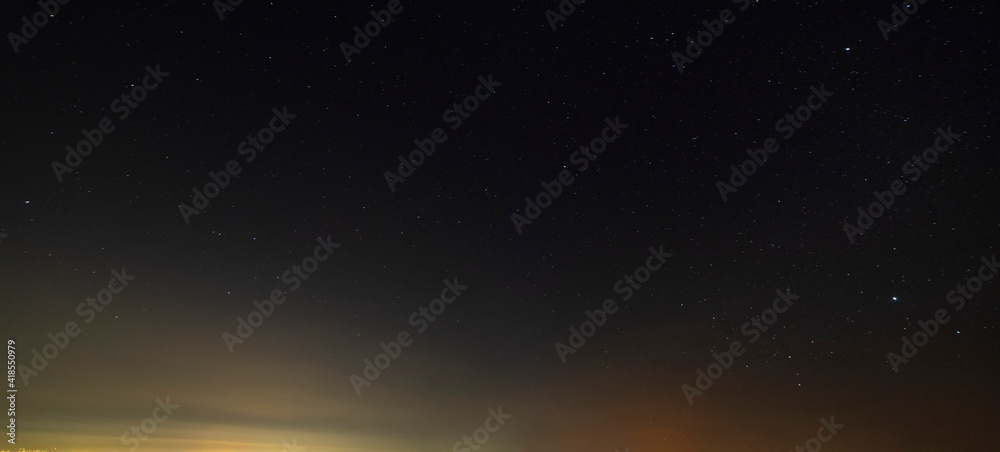 Beautiful winter dark starry sky. Night photography, astronomical background.