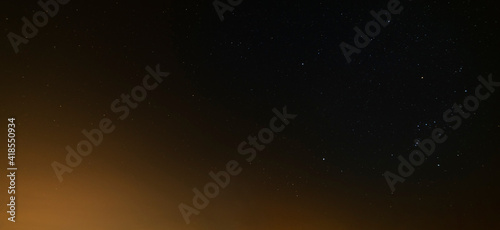 Beautiful winter dark starry sky. Night photography, astronomical background.