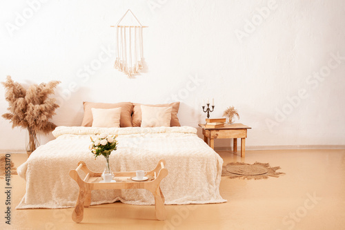 Interior  bedroom  photo studio. Beige brown fashionable. Pampas. Plants are flowers. copy space DIY mocup