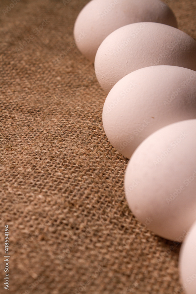 nest with eggs on a sackcloth. Happy Easter eggs. Background with easter eggs. nest with eggs on a sackcloth. Happy Easter eggs. Background with easter eggs.