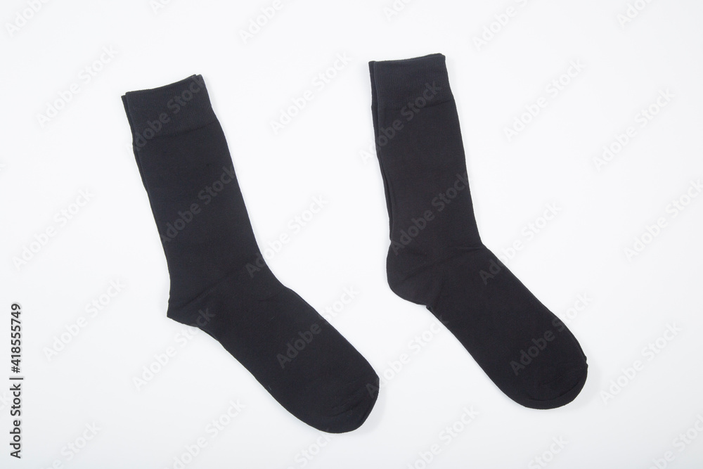 Black men's socks made of cotton on a white background. Black men's socks made of cotton on a white background.