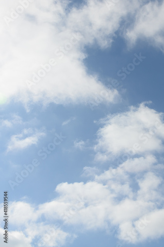 Spring bright blue sky with clouds. Abstract background  copy space