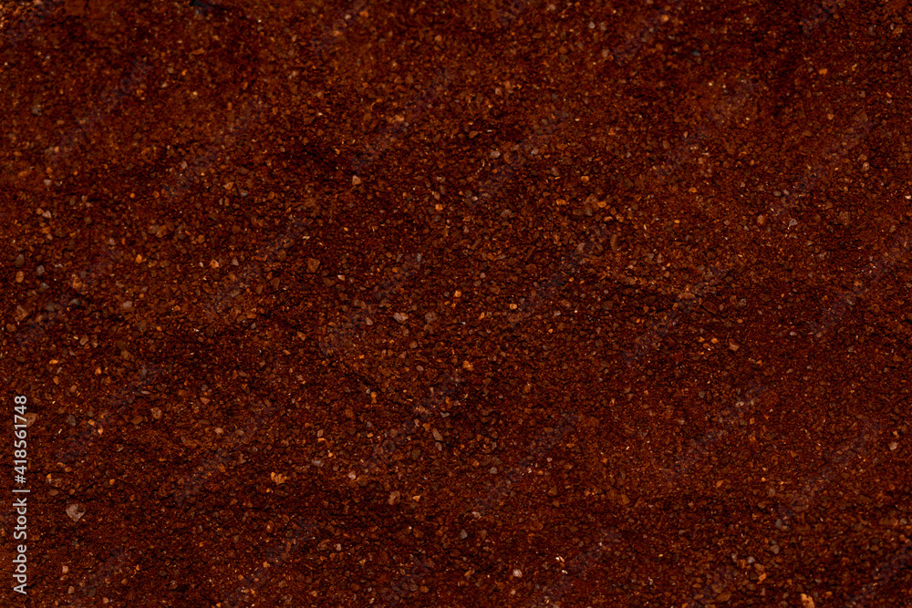 Ground coffee beans forming a background Ground coffee beans forming a background