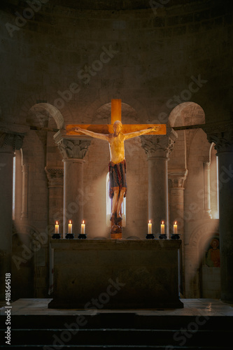 The altar and the crucifix of Sant'Antimo Abbey, Tuscany, Italy