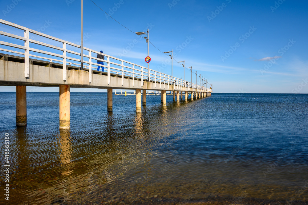 Pier in Mechelinki. Mechelinki is a fishing village and a popular tourist destination on the Baltic Sea in Poland