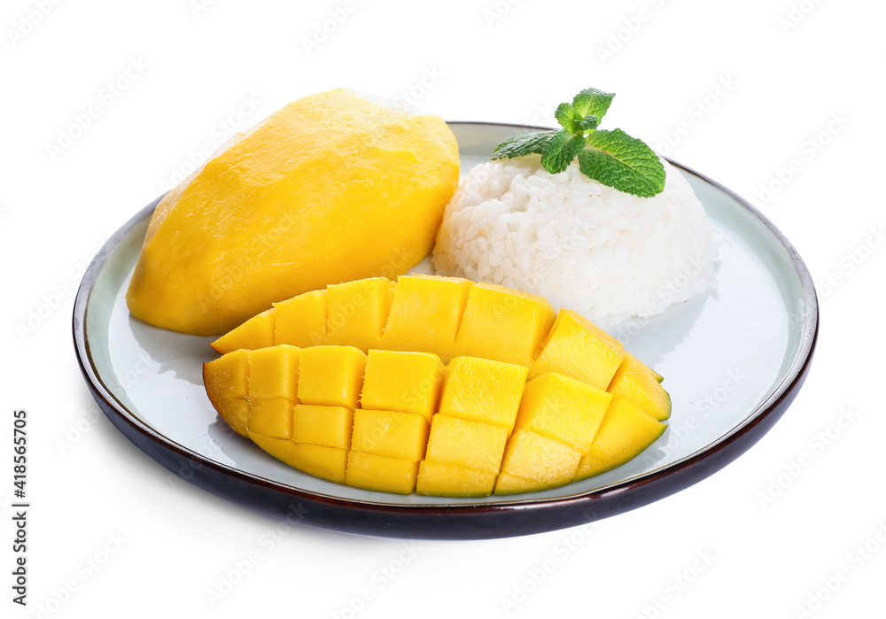 Plate with tasty rice and mango on white background Plate with tasty rice and mango on white background