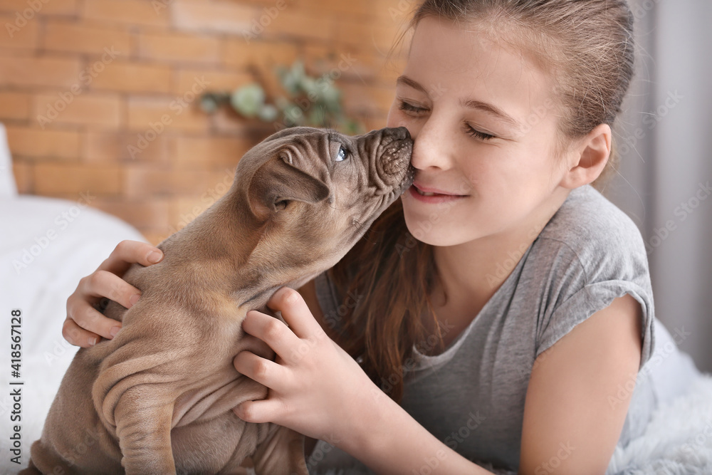 Cute girl with puppy at home Cute girl with puppy at home