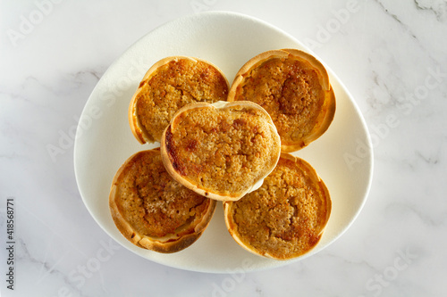 Fototapeta Naklejka Na Ścianę i Meble -  Traditional Portuguese pastry called Queijada de Sintra. Top view