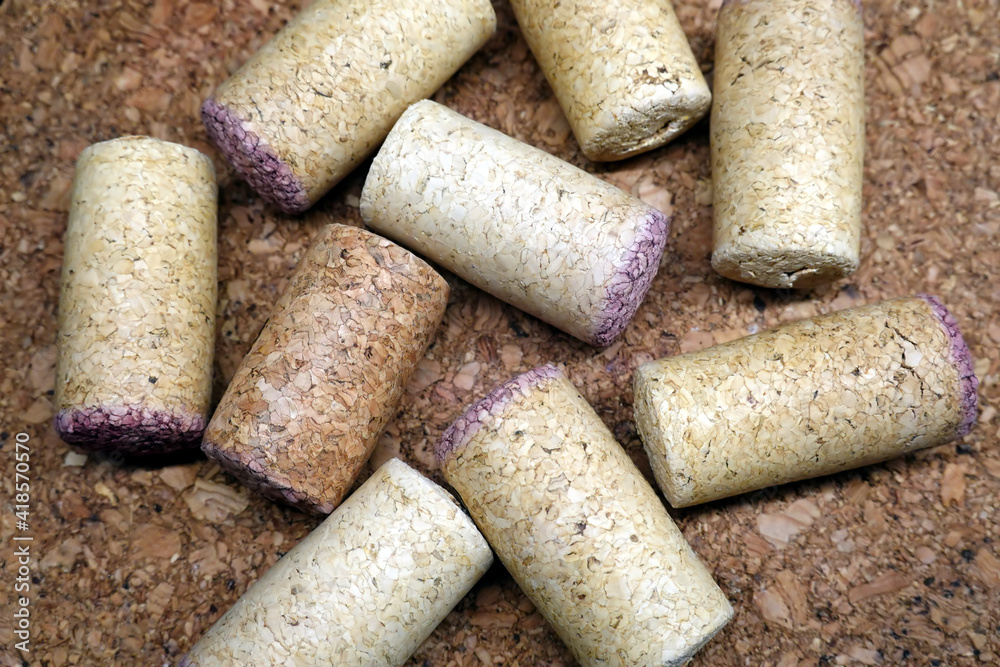 Still life with come wine corks on cork background top view close up Still life with come wine corks on cork background top view close up