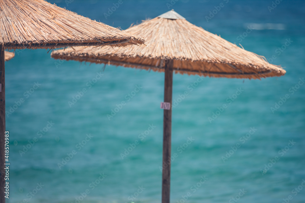 Beach with umbrellas and chairs