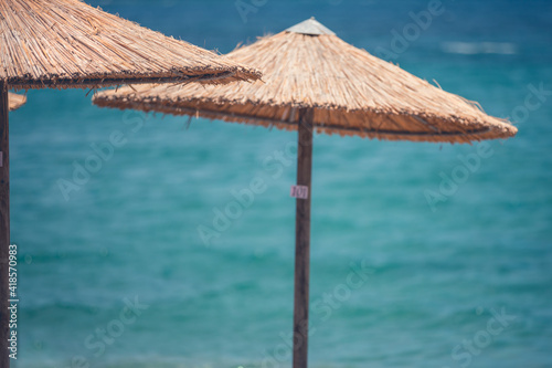 Fototapeta Naklejka Na Ścianę i Meble -  Beach with umbrellas and chairs