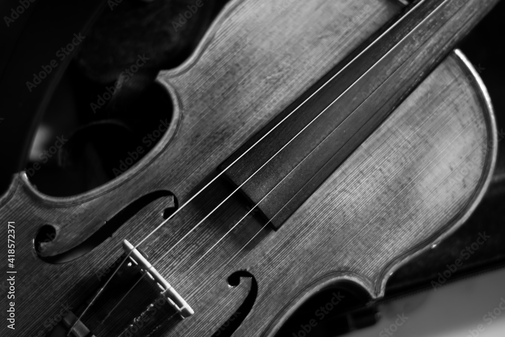 close up of a violin with dark background for copy space close up of a violin with dark background for copy space