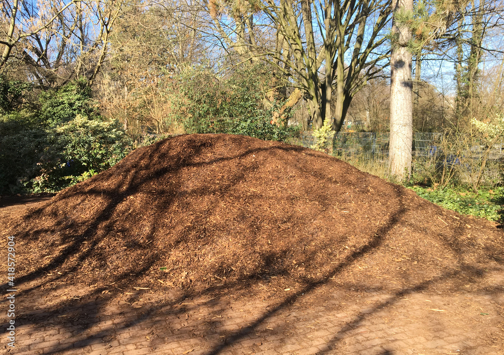 Pile of mulch that is applied to the surface of soil. Reasons for