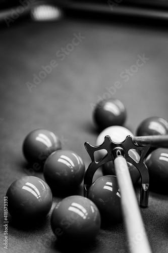 Spider rest in use at snooker table photo