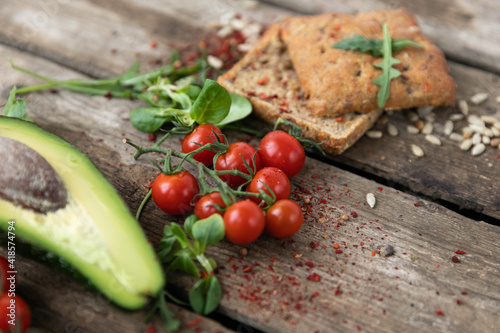 fresh tomatoes on a wooden table