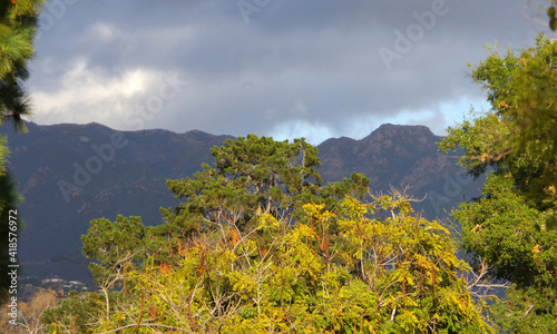 View from the south side of the Santa Ynez mountains in California under heave storm clouds after a winter rain photo