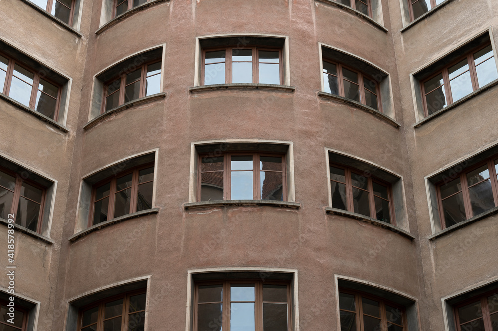 Architectural detail of a building from the inner courtyard, Windows are seen symmetrically