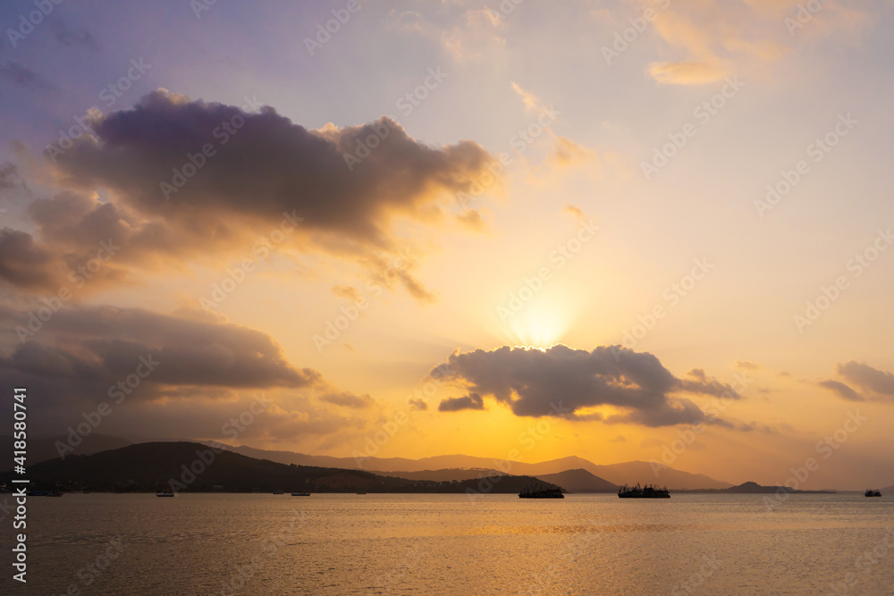 Sunset over the bay with fishing boats Sunset over the bay with fishing boats