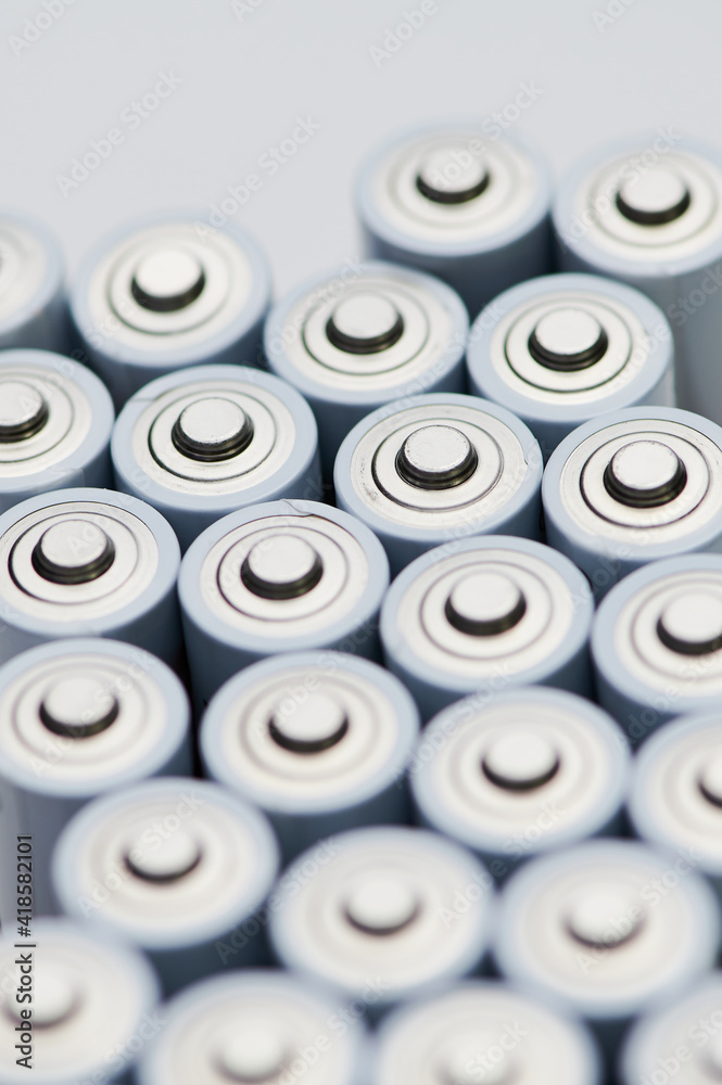 macro photo of batteries with the positive poles close up, background photo macro photo of batteries with the positive poles close up, background photo