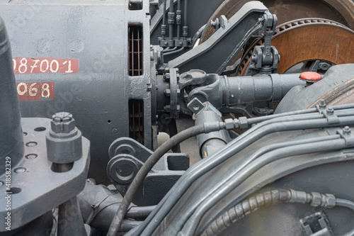 Detail of the mechanics of a train machine, electric motor and cardan shaft