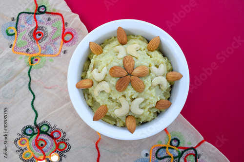 Shakarkandi or Shakarkand a root vegetable sweet dish from Gujarat India home cooked during upawas or vrat ka khana. For mahashivratri, ekadashi garnished with dryfruits decorated. Sweetpotato dessert photo