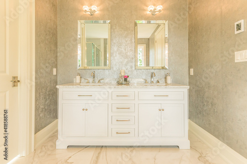 Contemporary staged luxury bathroom vanity marble floors