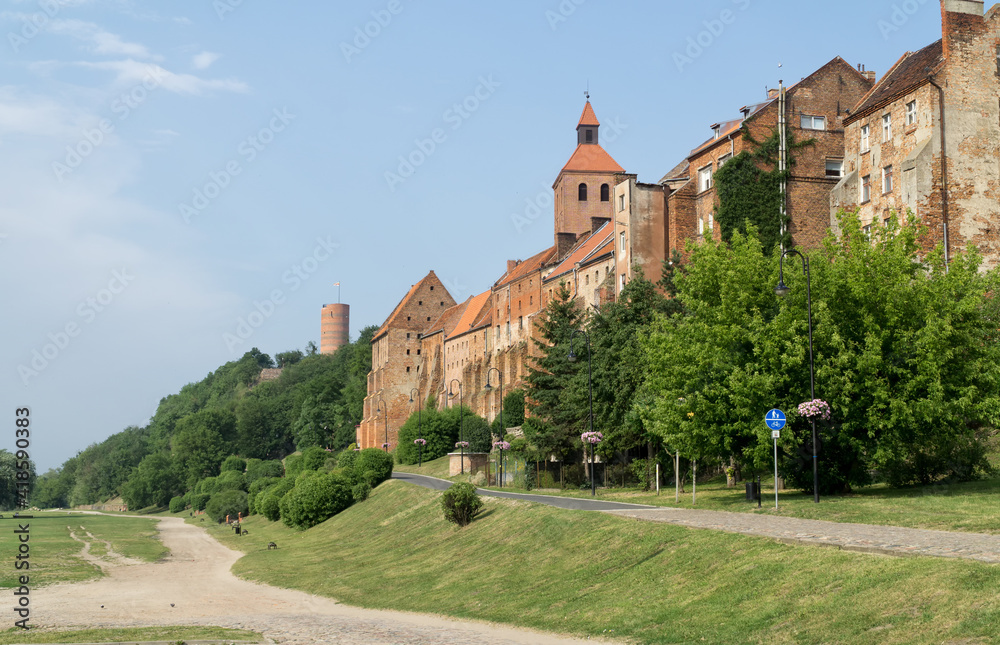 Grudziadz, Poland. Famous 14th century Granaries, tower of the church of Saint Nicholas,  and 13th century Klimek lookout tower of river bank on the Vistula river.
