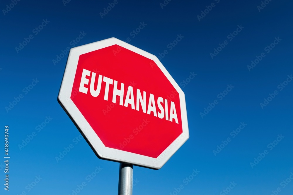 Stop sign with EUTHANASIA test to protest against voluntary suicide in case of suffering Stop sign with EUTHANASIA test to protest against voluntary suicide in case of suffering