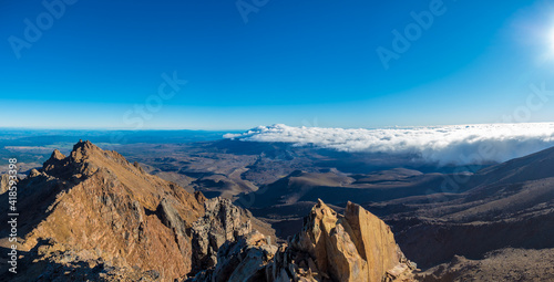 Mount ruapehu crater lake in summer with light snow photo