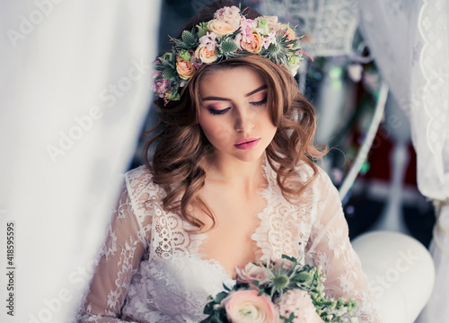 Soft focus portrait of beautiful bride with wedding hairstyle and makeup