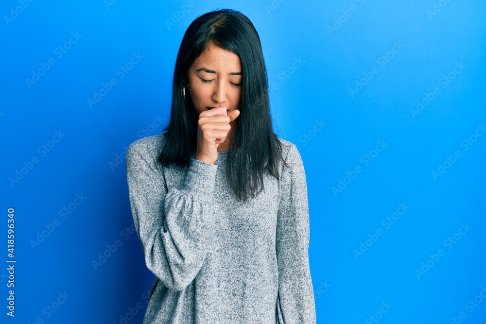 Beautiful asian young woman wearing casual clothes feeling unwell and coughing as symptom for cold or bronchitis. health care concept. Beautiful asian young woman wearing casual clothes feeling unwell and coughing as symptom for cold or bronchitis. health care concept.