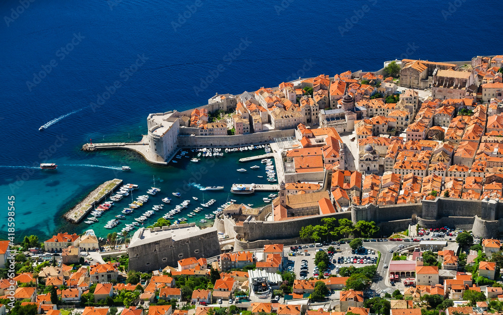 Dubrovnik, Croatia. View on the old town from high mountain. Top view rocks at on the old castle and blue sea. Vacation and adventure. Travel image