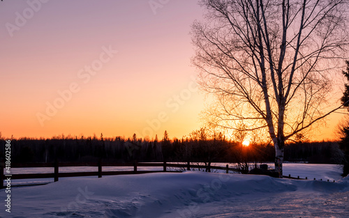 Sunset on winter farmland © Yan