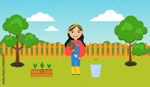 A nice girl in a suit, is engaged in gardening. The girl in the garden transplants plants. Garden scene, trees seedlings, garden tools