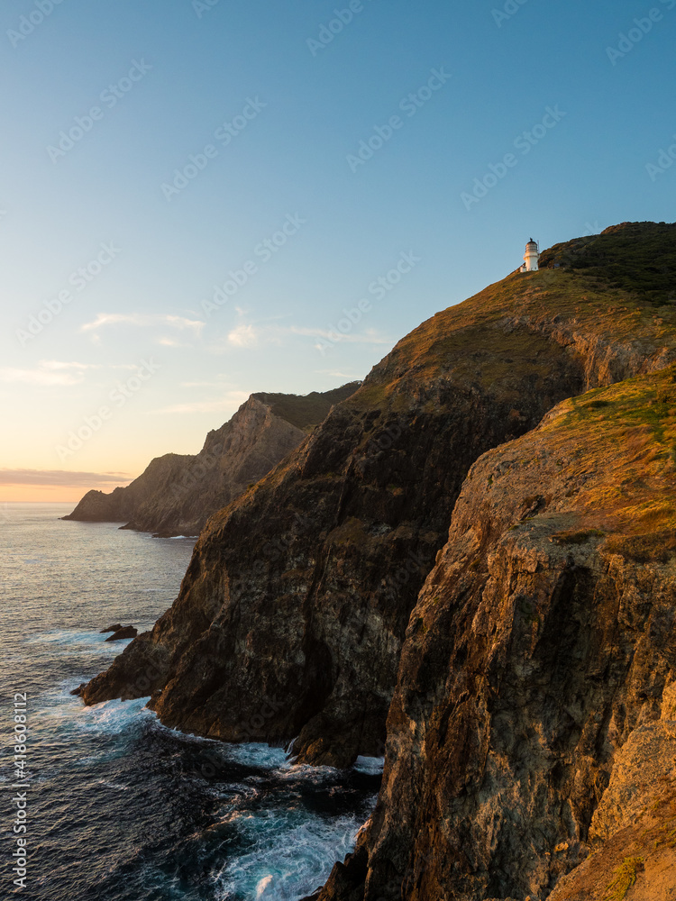 Cape Brett Lighthouse and Cape Brett Hut in Rawhiti New Zealand Cape Brett Lighthouse and Cape Brett Hut in Rawhiti New Zealand