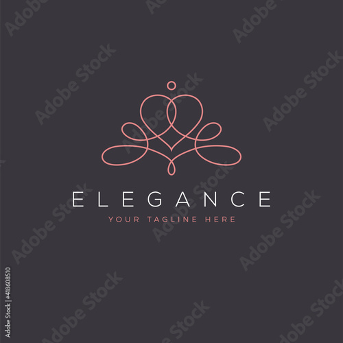 Ornate feminine elegant abstract logo with a heart shape in a modern mono line style.