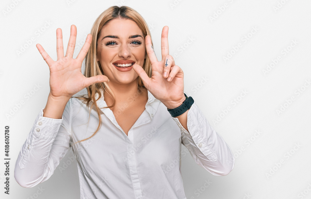 Young caucasian woman wearing casual clothes showing and pointing up with fingers number eight while smiling confident and happy. Young caucasian woman wearing casual clothes showing and pointing up with fingers number eight while smiling confident and happy.